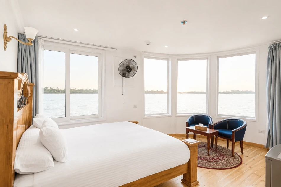 Spacious suite with Nile River views aboard Fatima Dahabiya Nile Cruise
