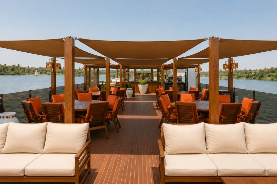 Outdoor lounge seating on the sun deck of Iris Dahabiya Nile Cruise