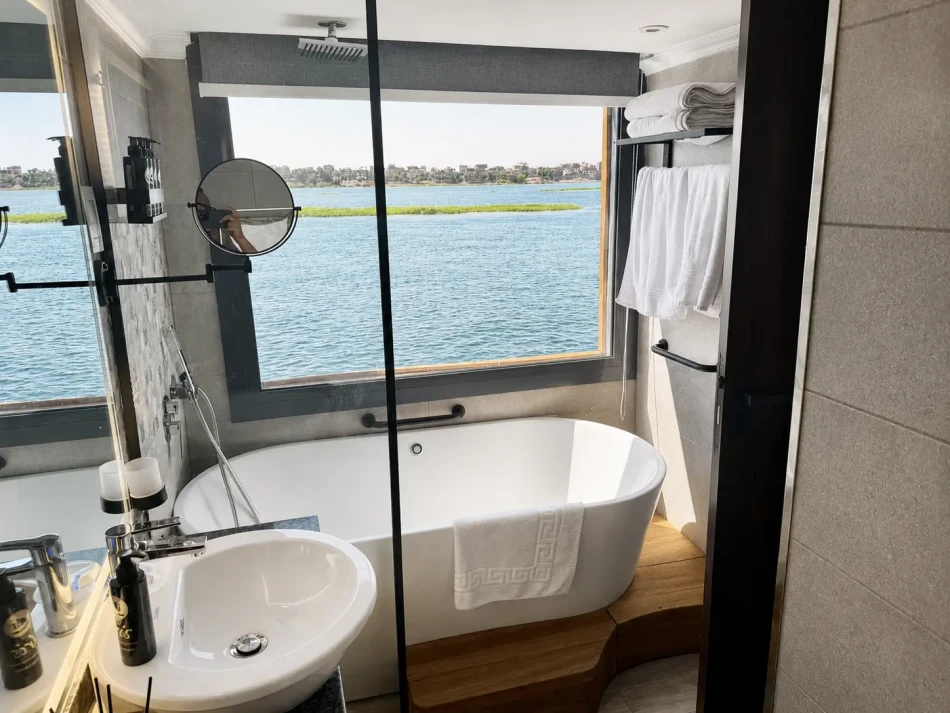 Suite bathroom with bathtub aboard Iris Dahabiya Nile Cruise