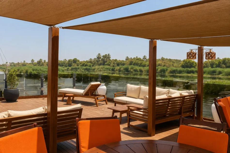 Shaded seating area on the sun deck of Iris Dahabiya Nile Cruise