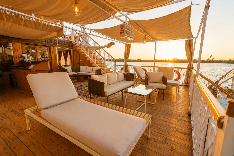 Sun lounger overlooking the Nile River aboard Sila Dahabiya Nile Cruise