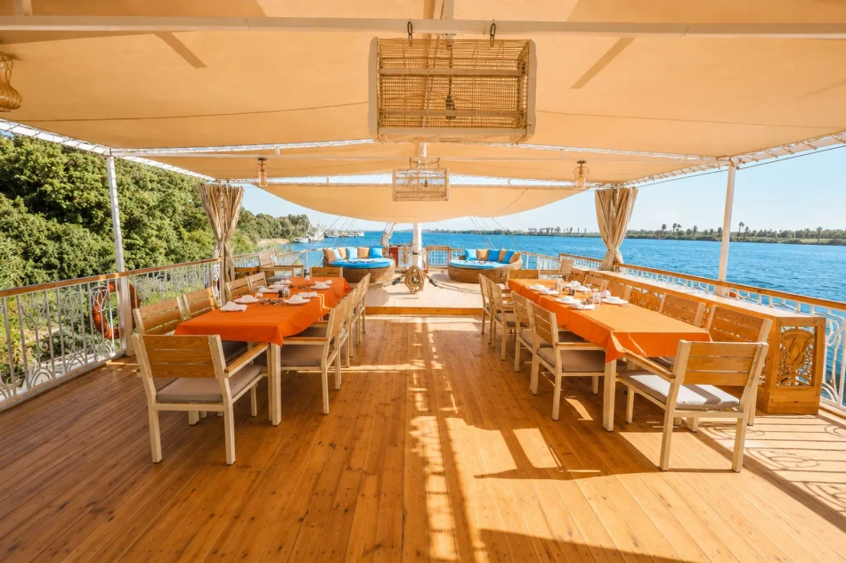 Open-air dining area on the sun deck of Sila Dahabiya Nile Cruise