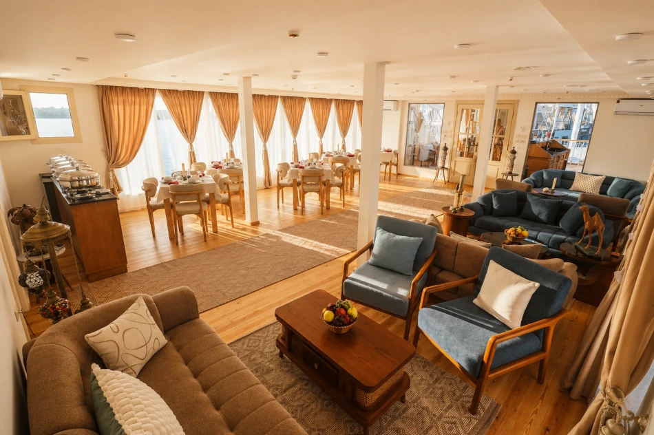 Lounge interior with seating aboard Sila Dahabiya Nile Cruise