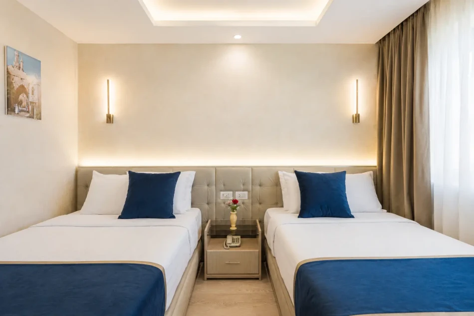 Twin cabin with two separate beds aboard Merit Dahabiya Nile Cruise