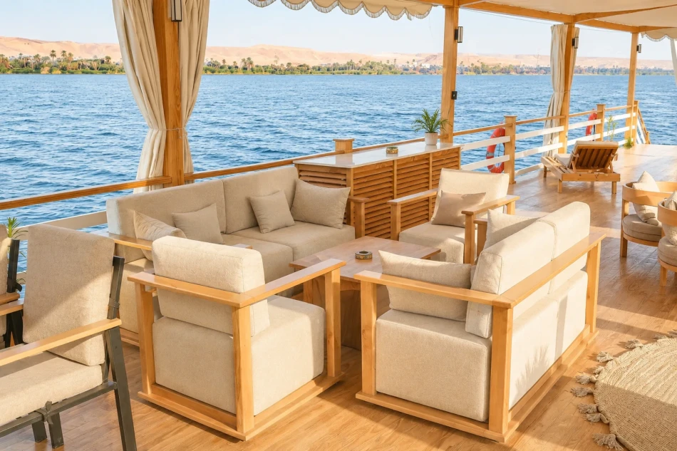 Shaded seating area on the sun deck of Swan Dahabiya Nile Cruise