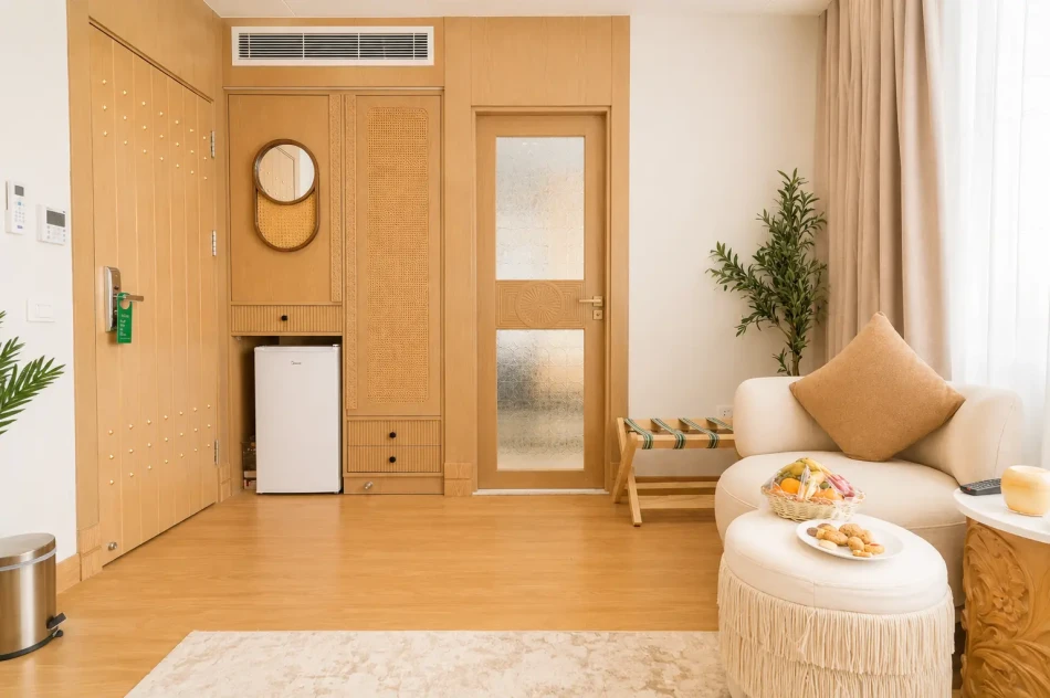 Suite interior with seating area aboard Nayera Dahabiya Nile Cruise