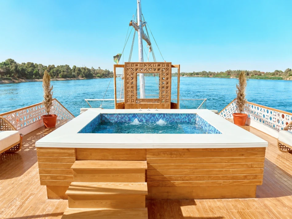 Outdoor jacuzzi overlooking the Nile River aboard Nayera Dahabiya Nile Cruise
