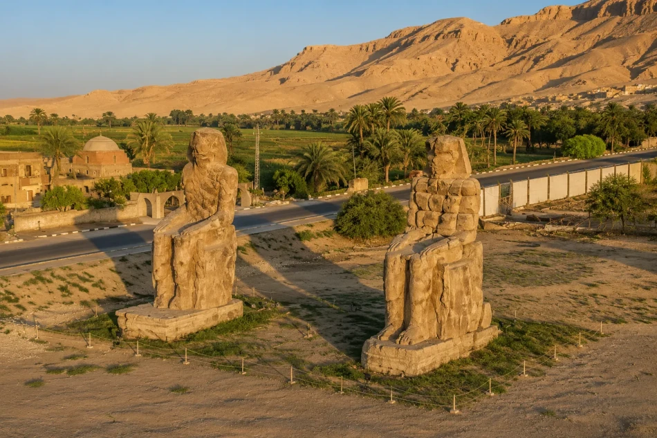 Colossi of Memnon in Luxor visited during a Dahabiya Nile River cruise from Aswan to Luxor.