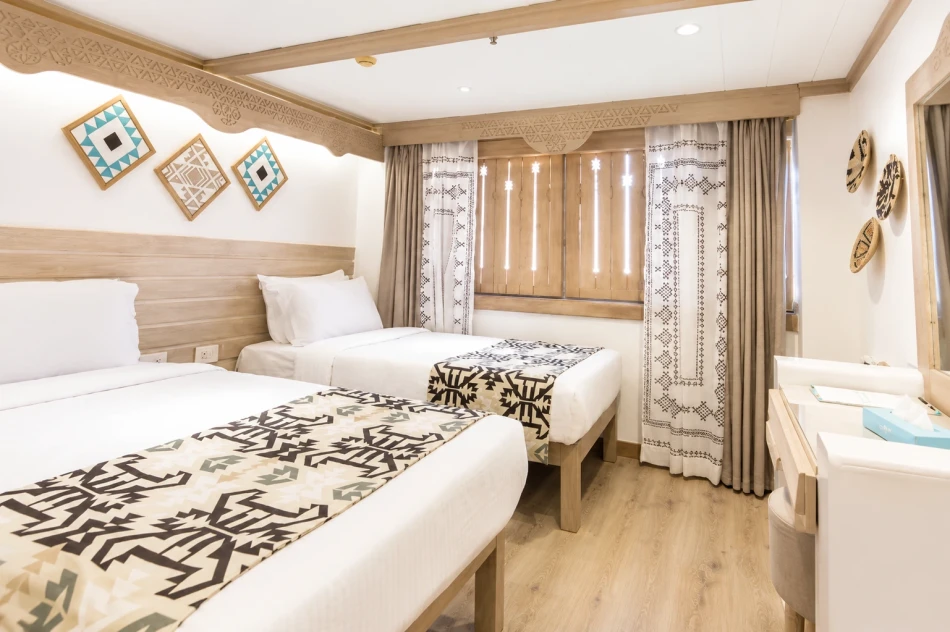 Twin cabin with two separate beds aboard Mahrousa Nile Cruise